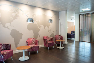 four pink floral sofa chairs