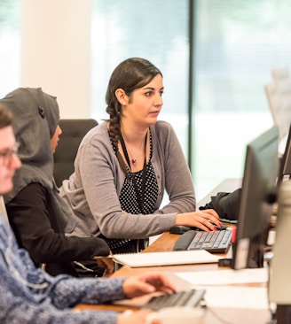 unknown persons using computer indoors