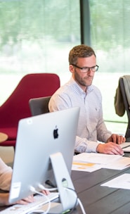 man sitting in front of table