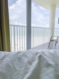 window overlooking a beach