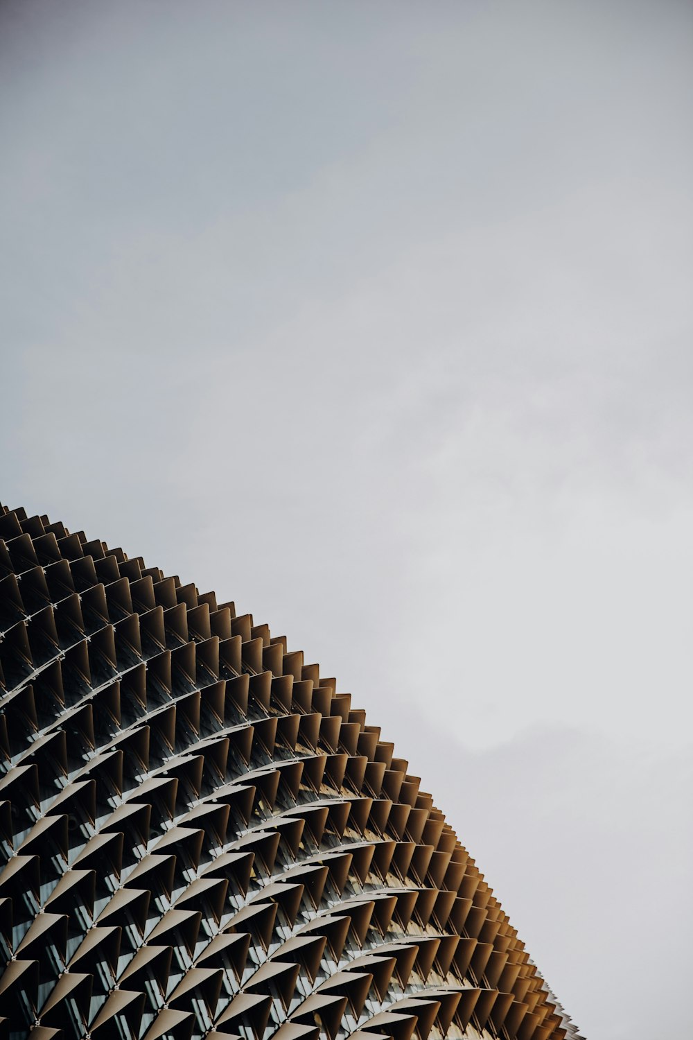 a very tall building with a sky in the background