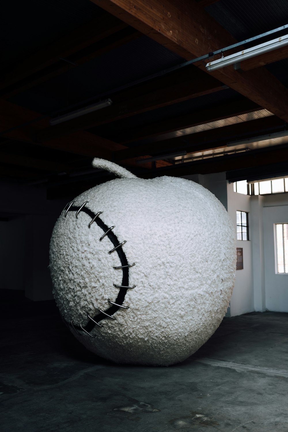 white apple statue