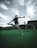 man playing soccer during daytime