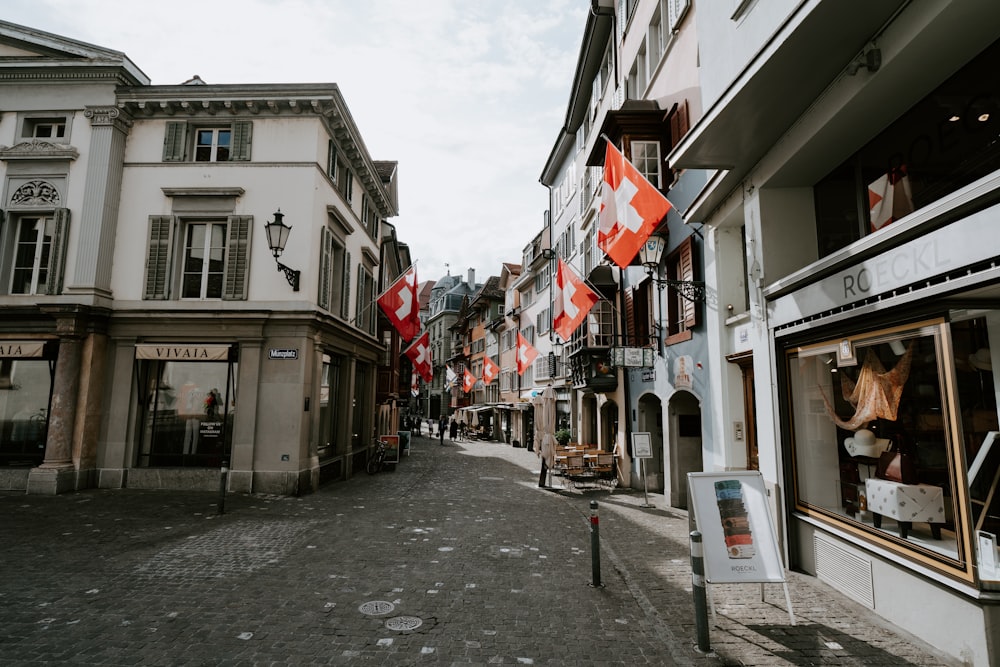 buildings with flags during day