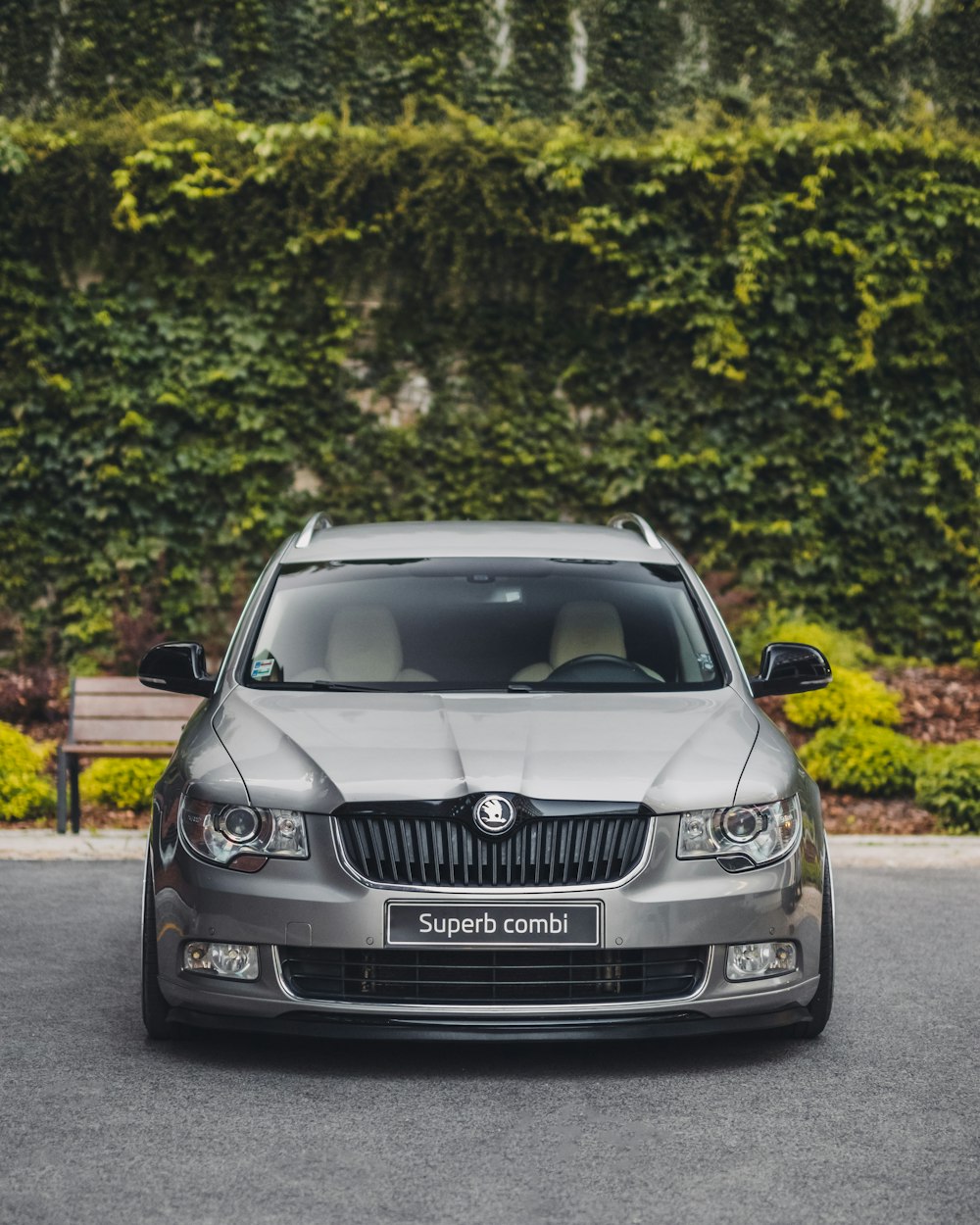 silver car parked near wall during daytime