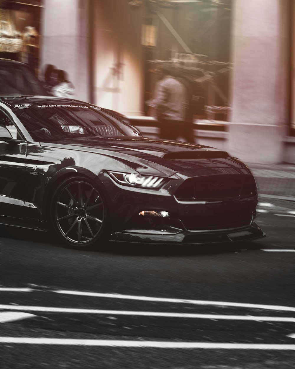 black coupe on street