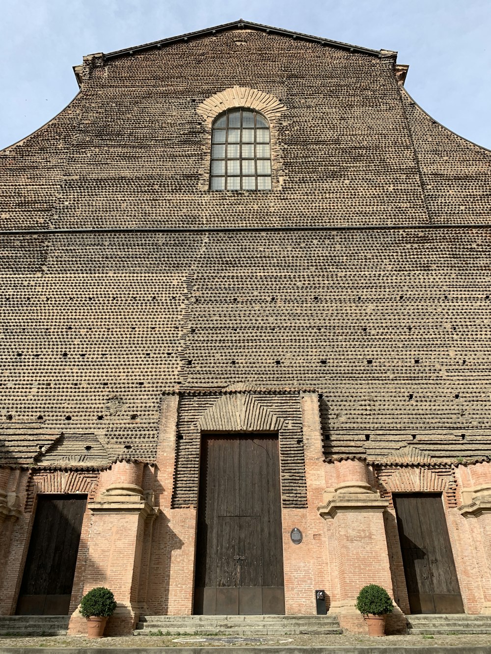 low-angle photograph of brown building