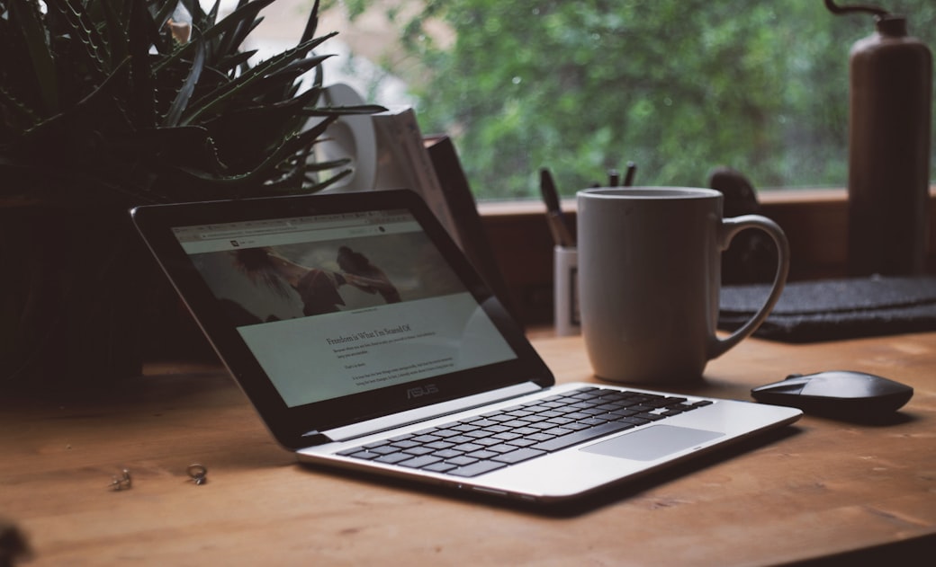 Medium Freelance Digital Nomad Writer Workspace on the Desk With Coffee