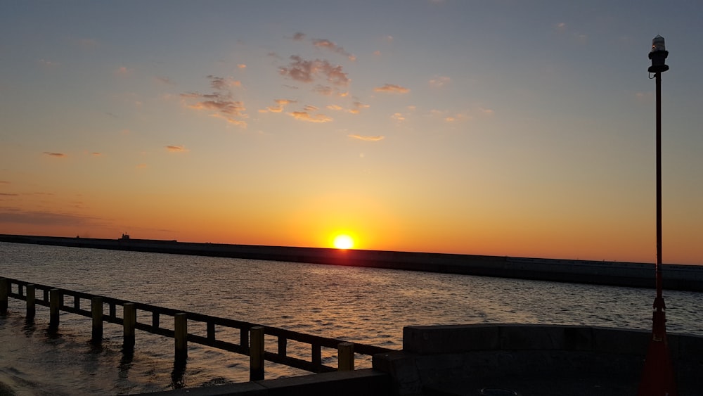 calm sea under sunrise view