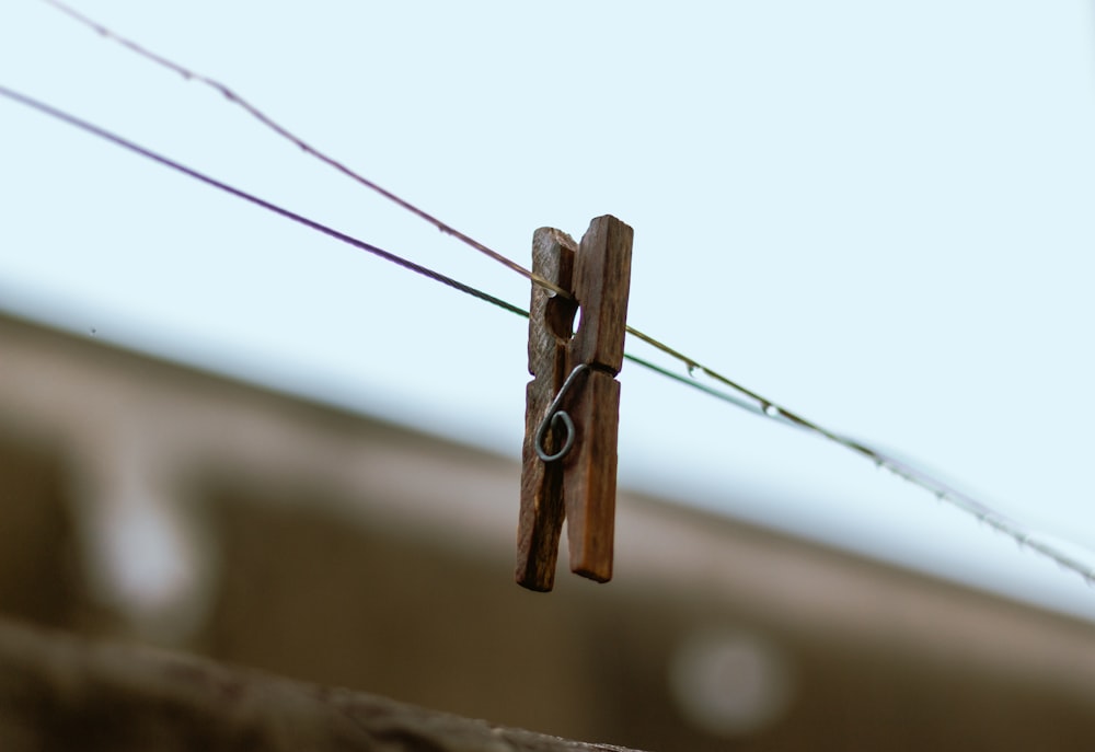 brown clothes clip on clothesline