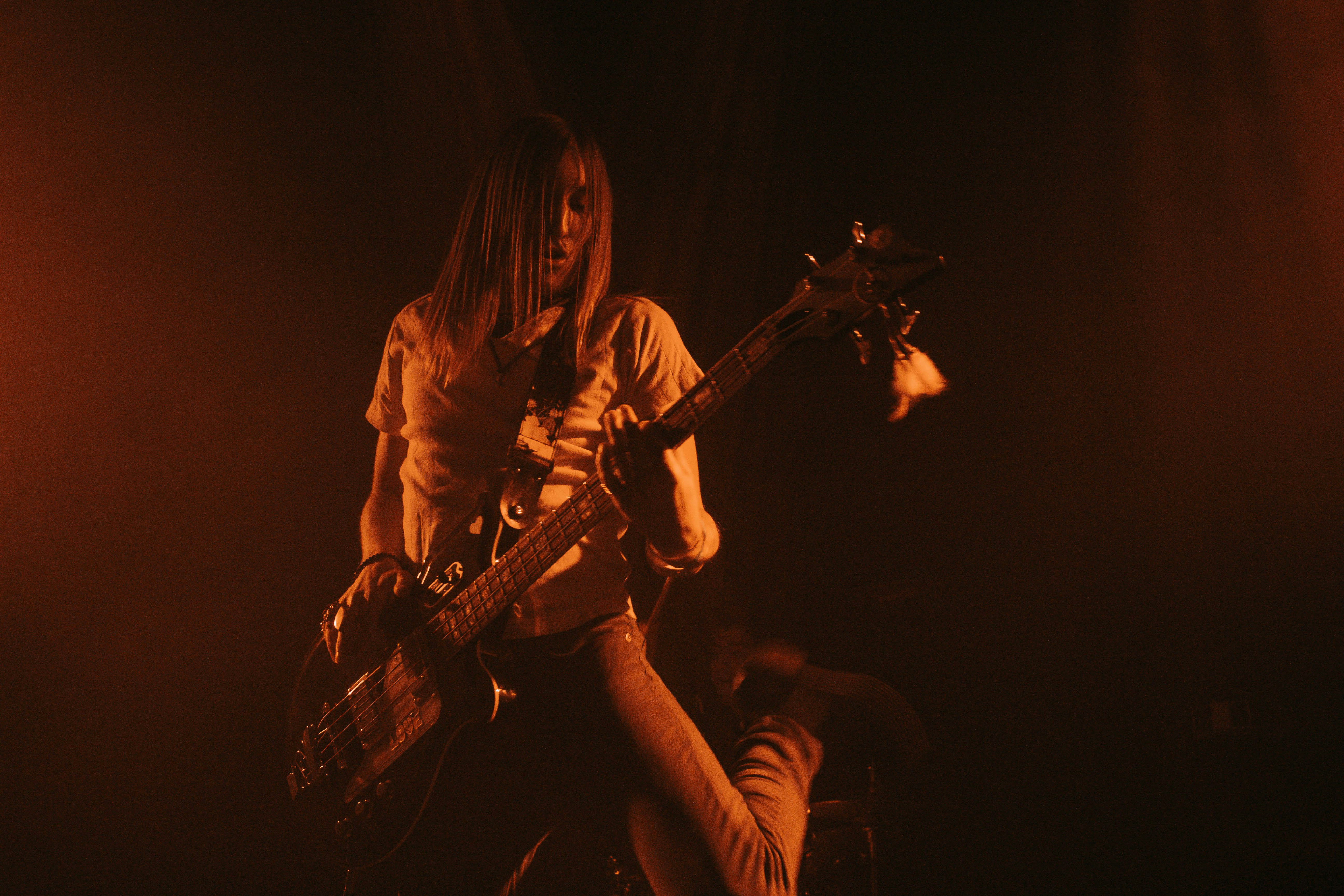 woman playing guitar photography