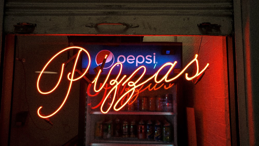 lighted pizzas neon light signage