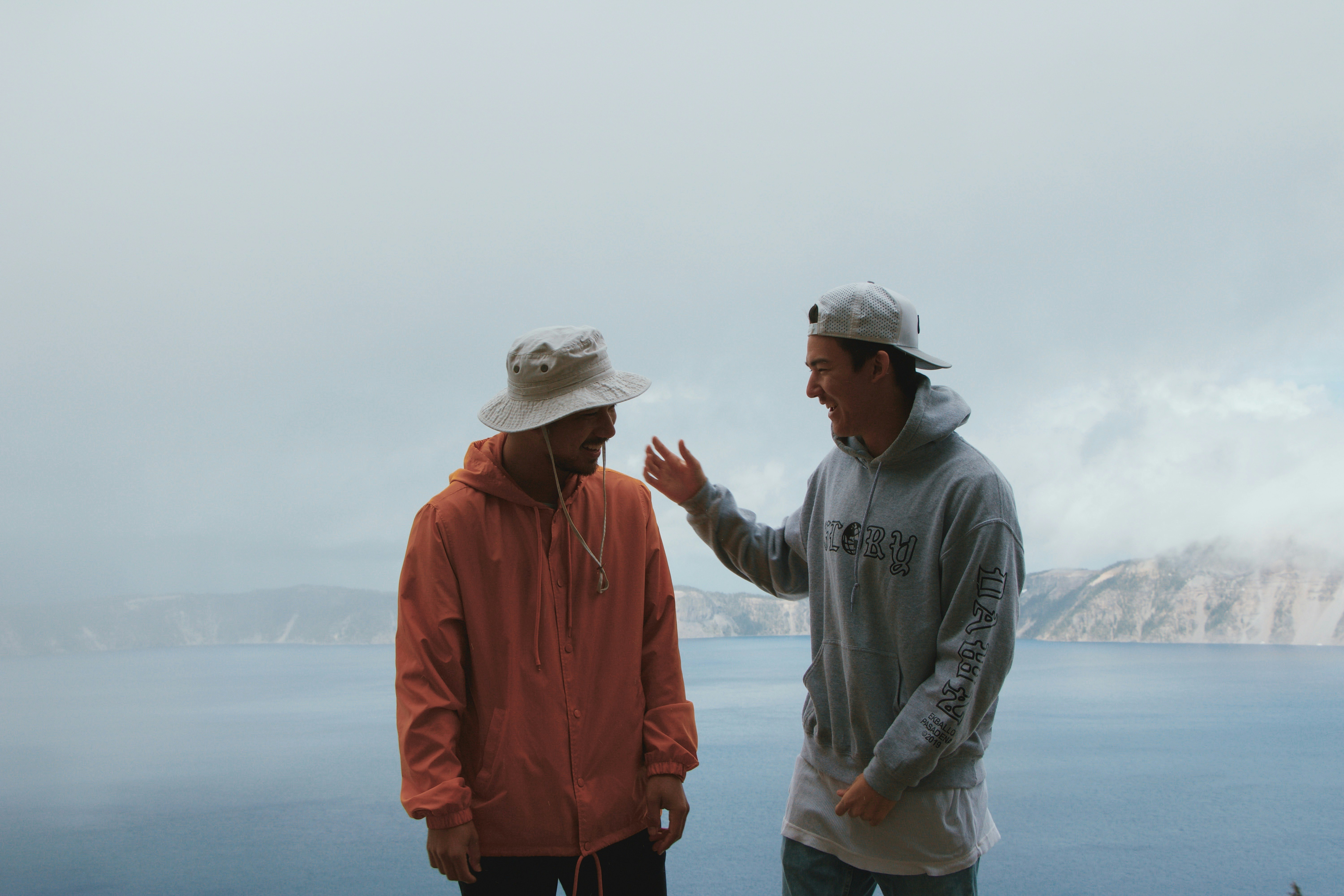 man wearing orange jacket