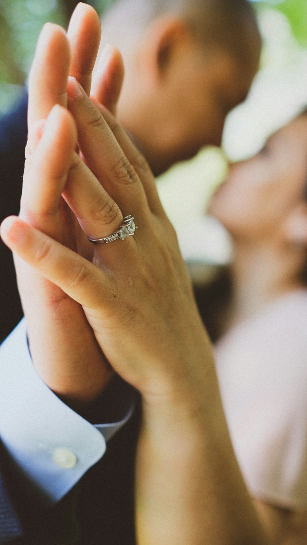 man and woman holding each others hands