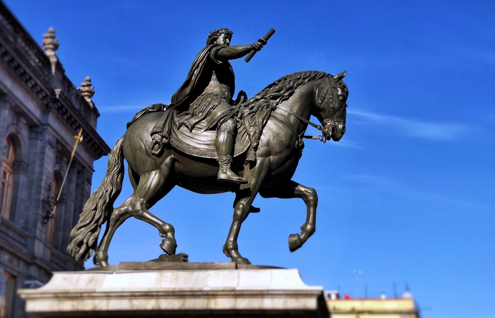 man riding horse statue