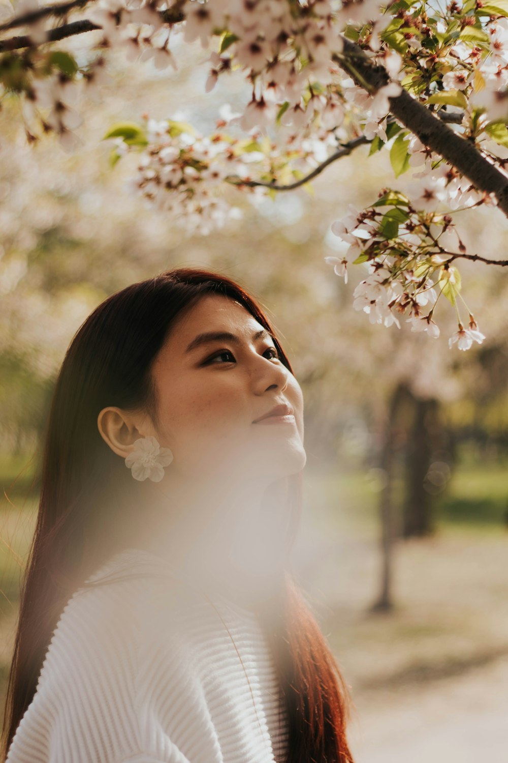 woman standing near tree