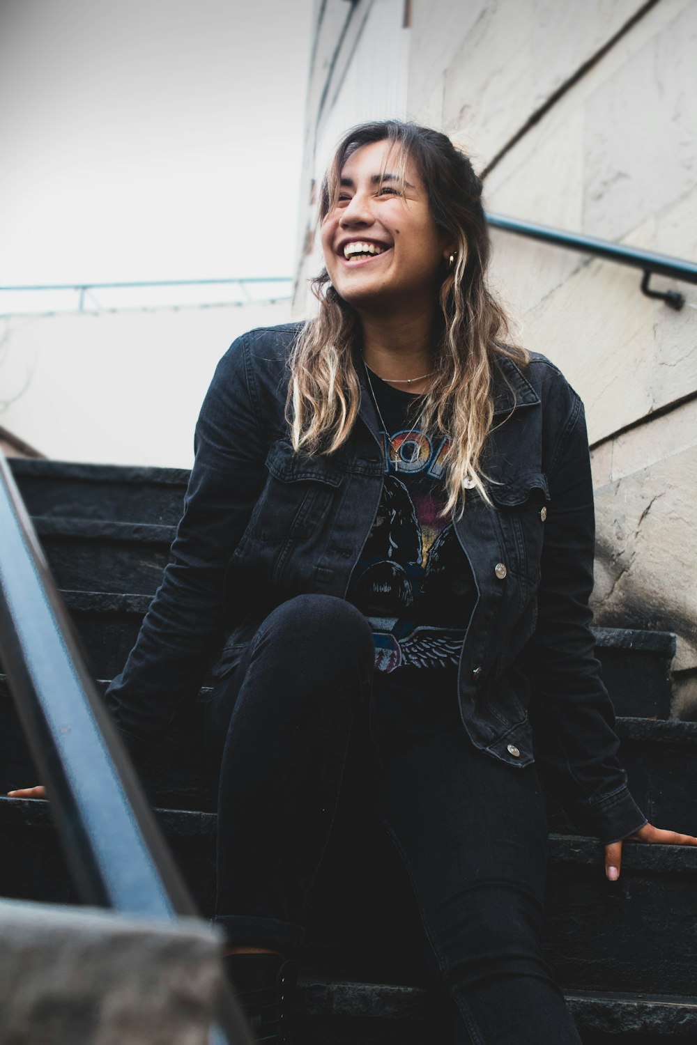 woman sitting on stair