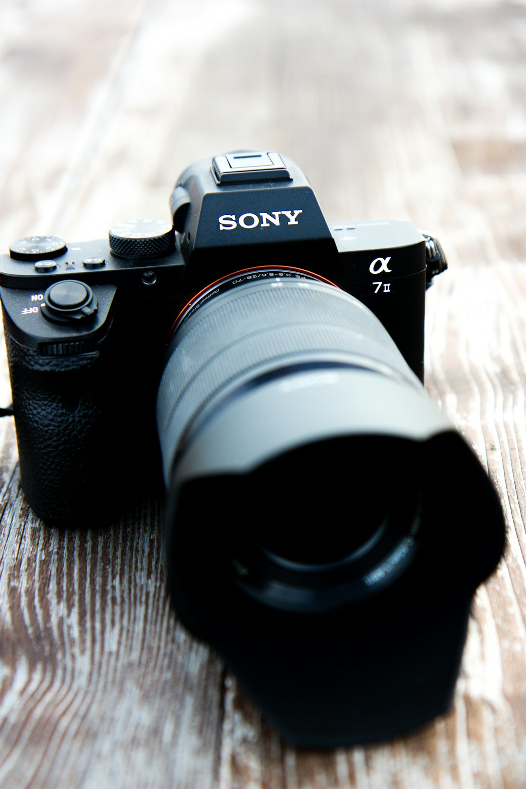 black Sony Alpha 7 DSLR camera