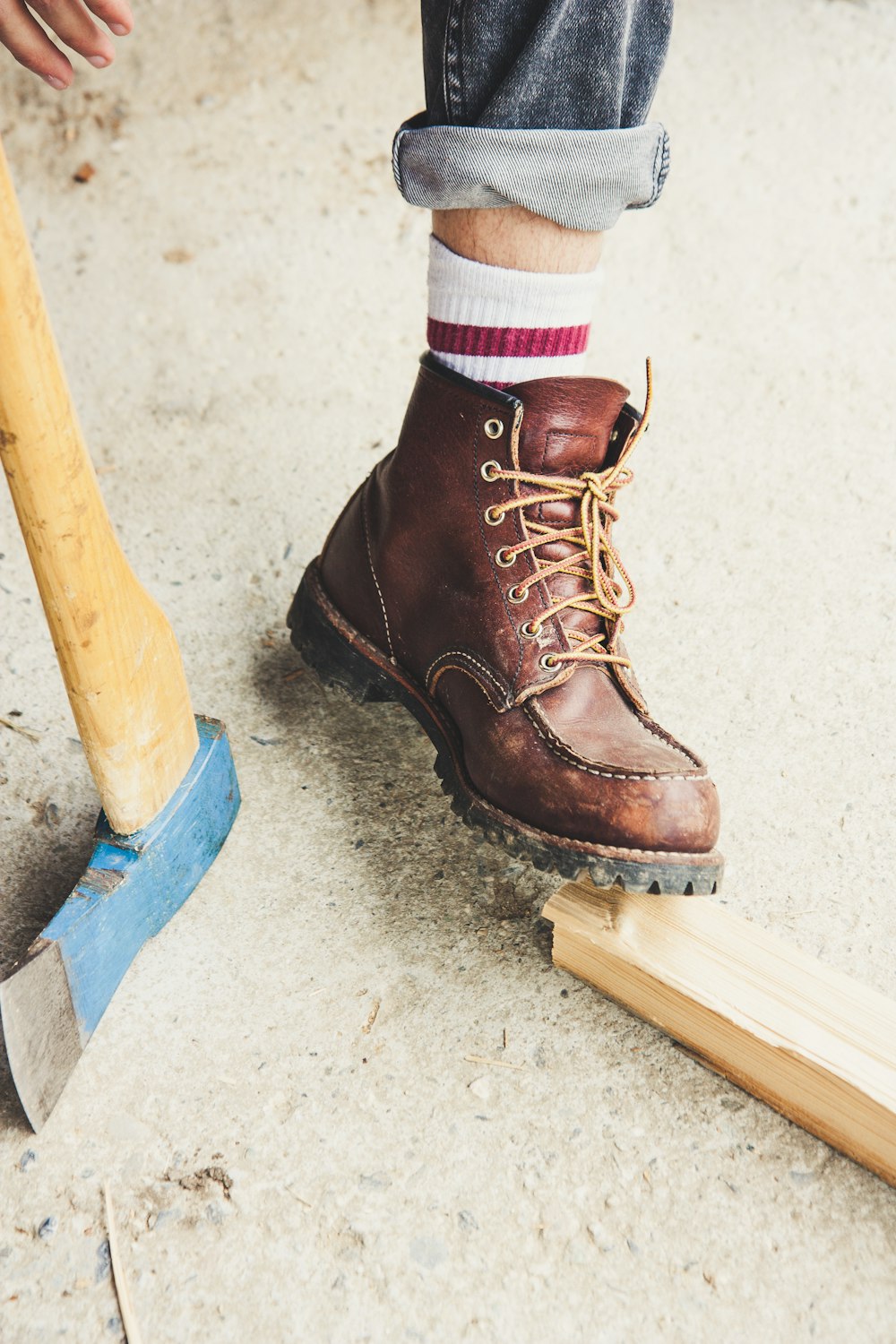 person wearing brown dress shoe