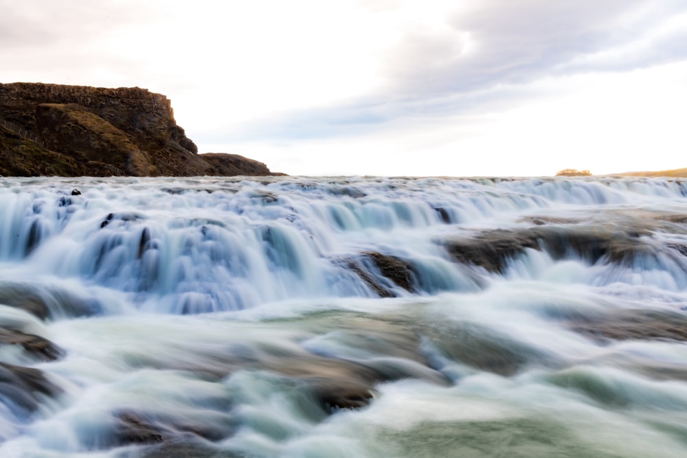 long exposure photography of body of water