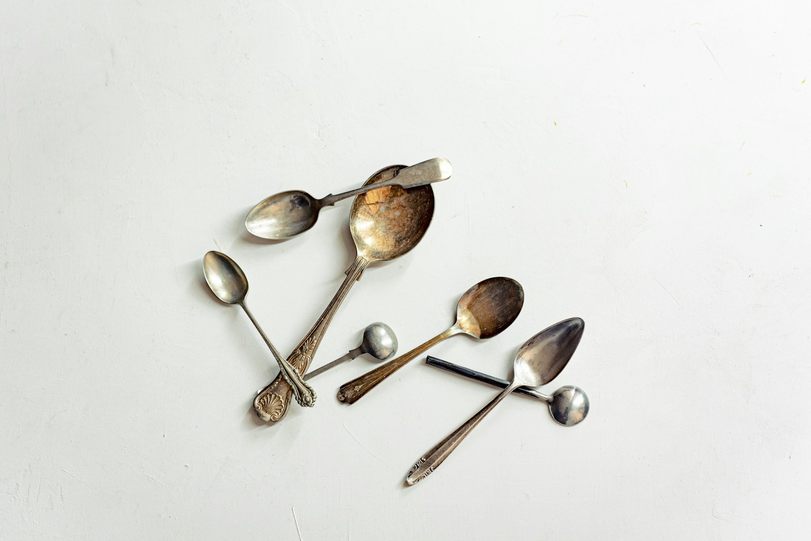 Sell sterling silver flatware and silverware for cash in NYC — silver spoons, forks and tea sets bought by Astoria Gold Buyer Pawn Shop in Queens