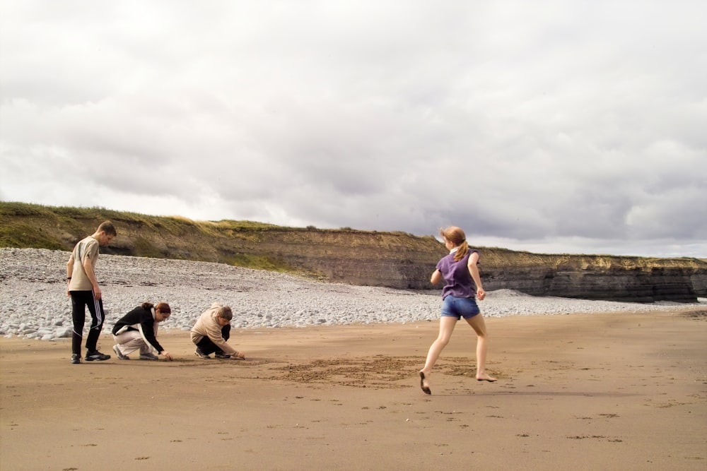 woman and men on shore