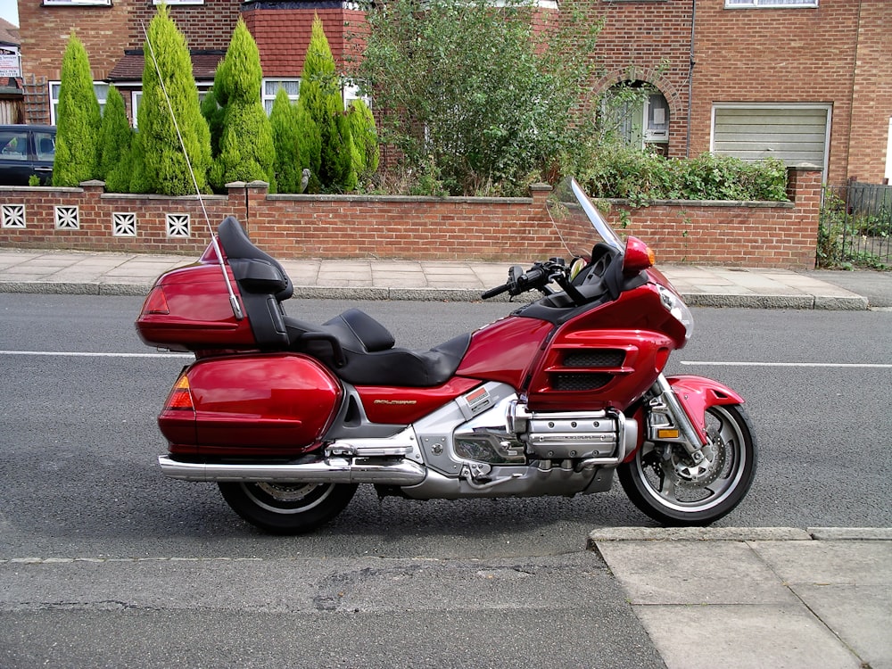 red and black touring motorcycle
