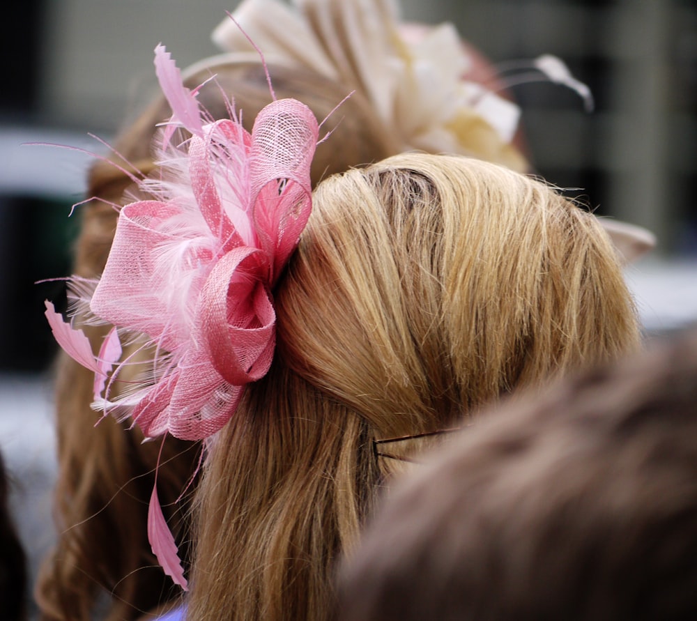 selective focus photography of pink headdress