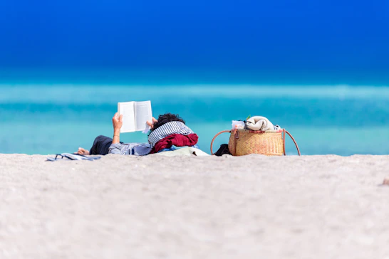 person lying on shore