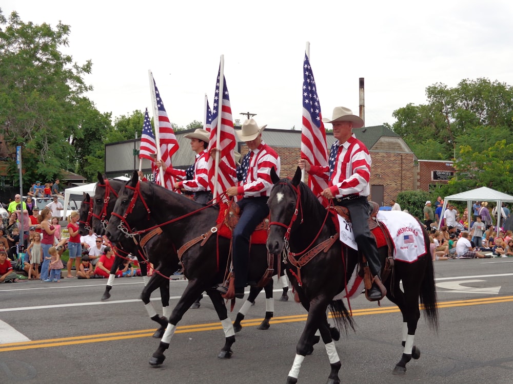 man riding horse during daytime