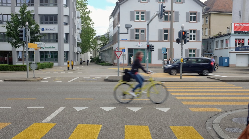 woman riding bike on empty road