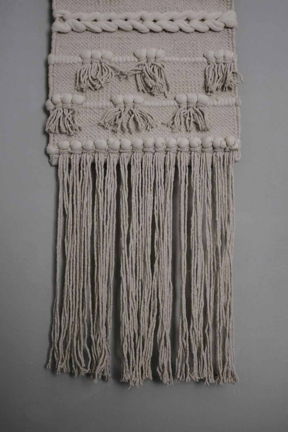 white fringe textile