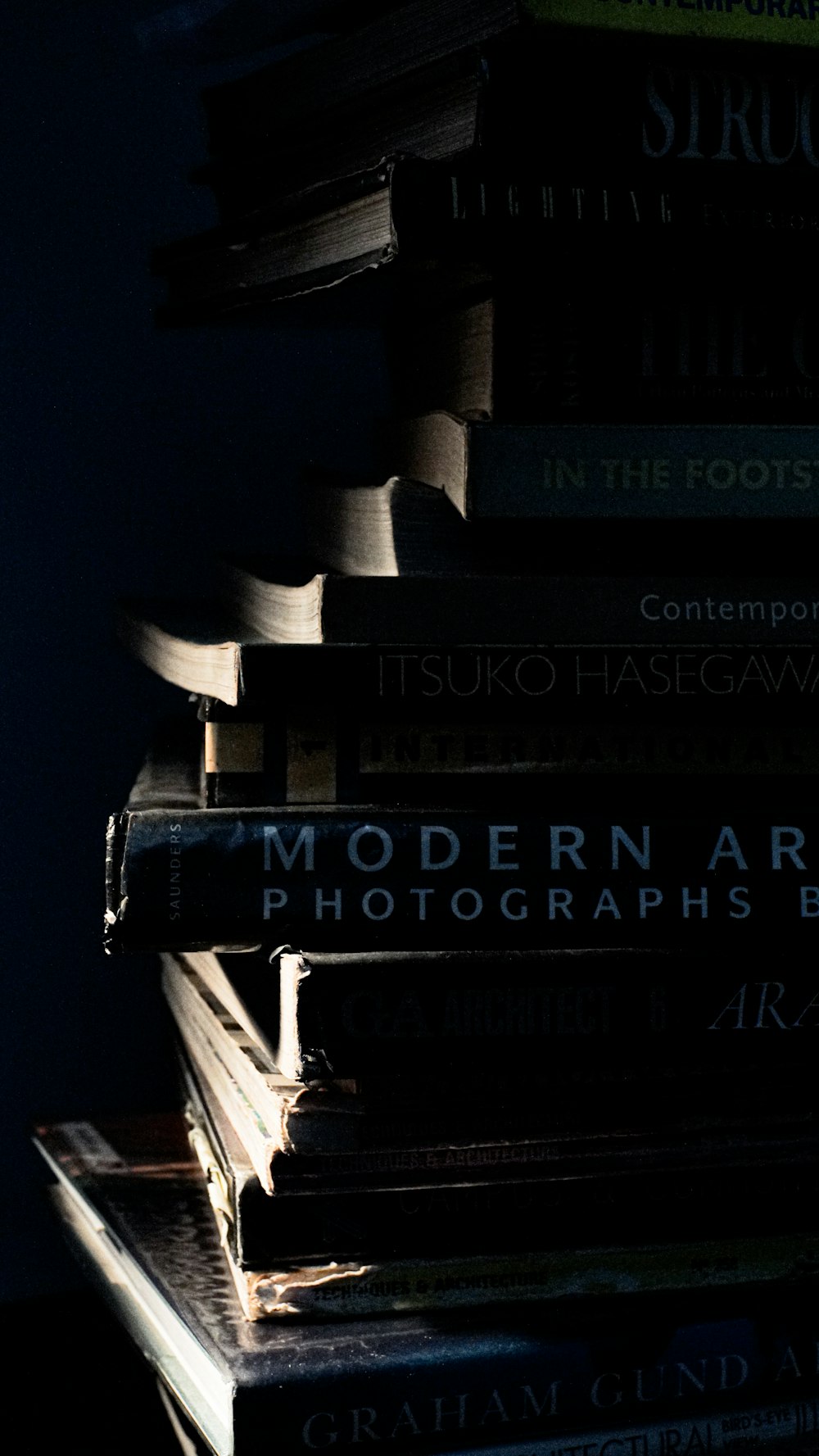 a stack of books sitting on top of each other