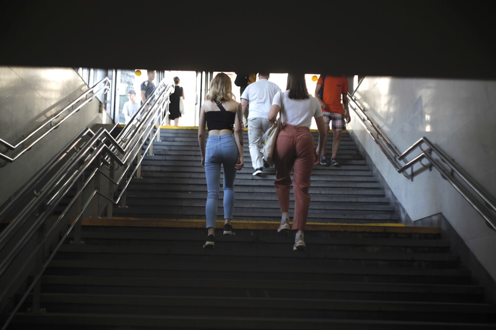 two women walking on upstairs