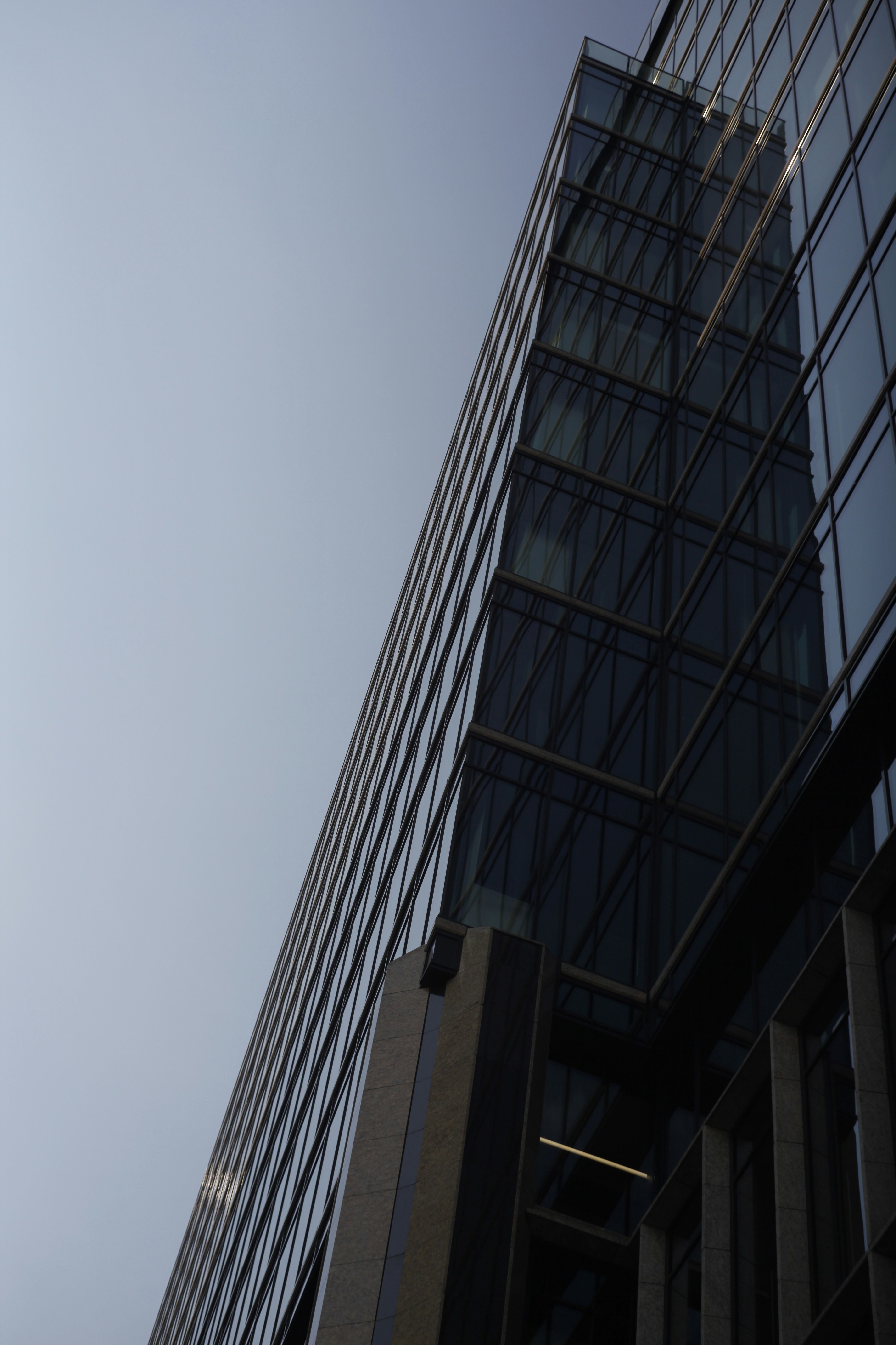 a very tall building next to a very tall building