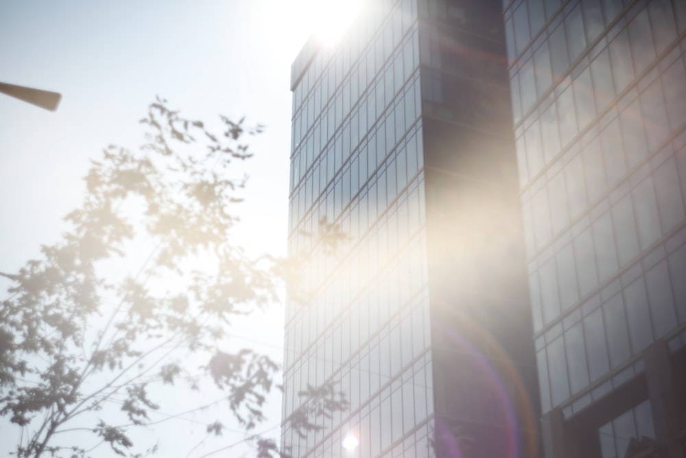 a street light in front of a tall building