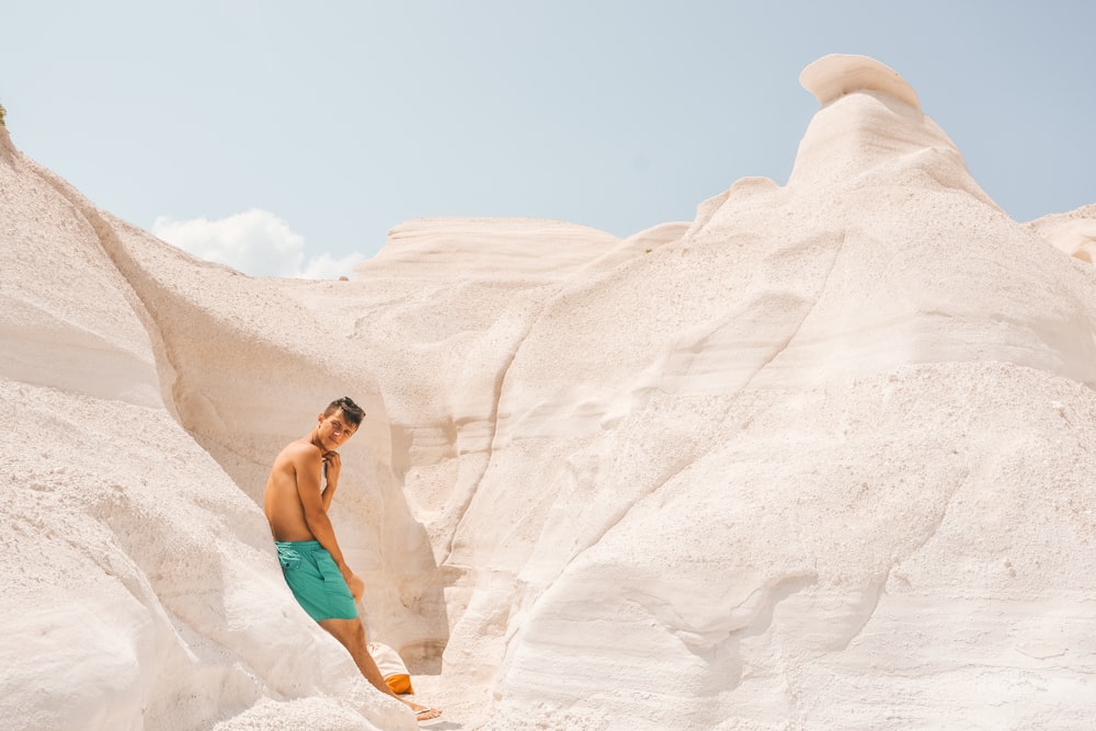 man standing on rock