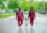 unknown persons walking on road