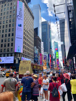 An exciting city tour scene with happy tourists exploring vibrant streets and landmarks.