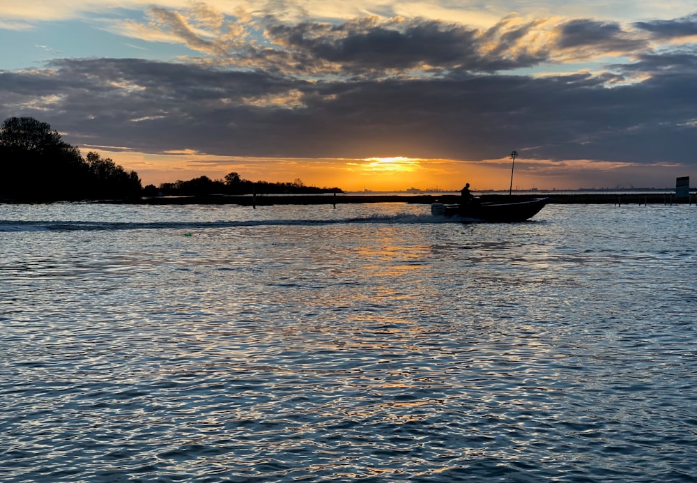 sailing boat during sunset