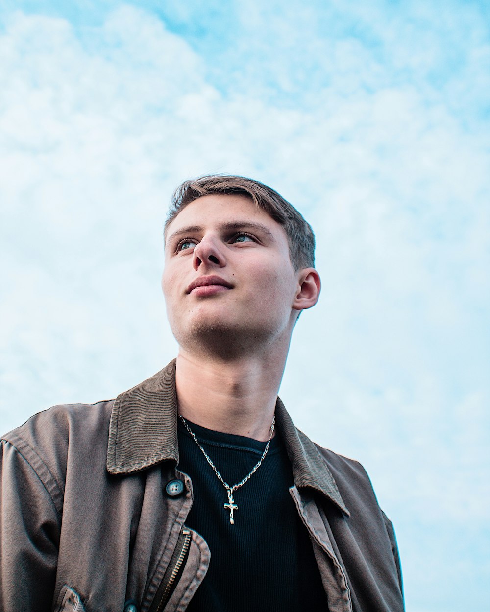 man wearing brown jacket