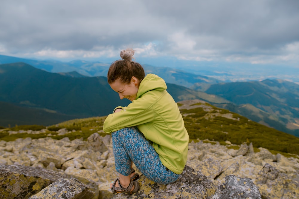 woman in green hoodie