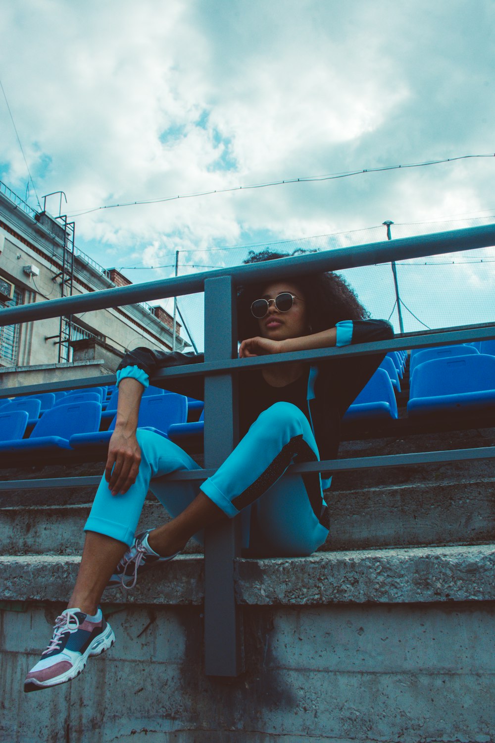 woman wearing blue pants during daytime