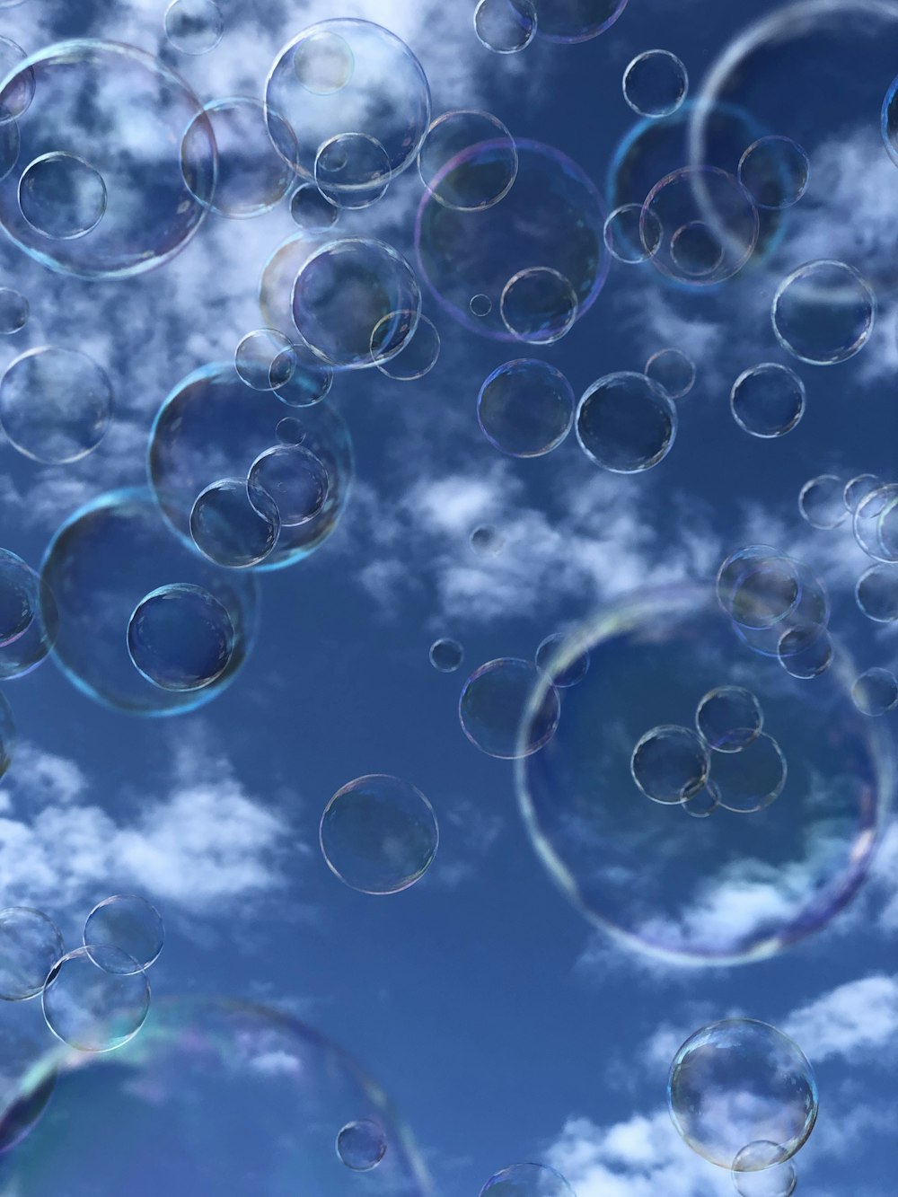 a bunch of soap bubbles floating in the air