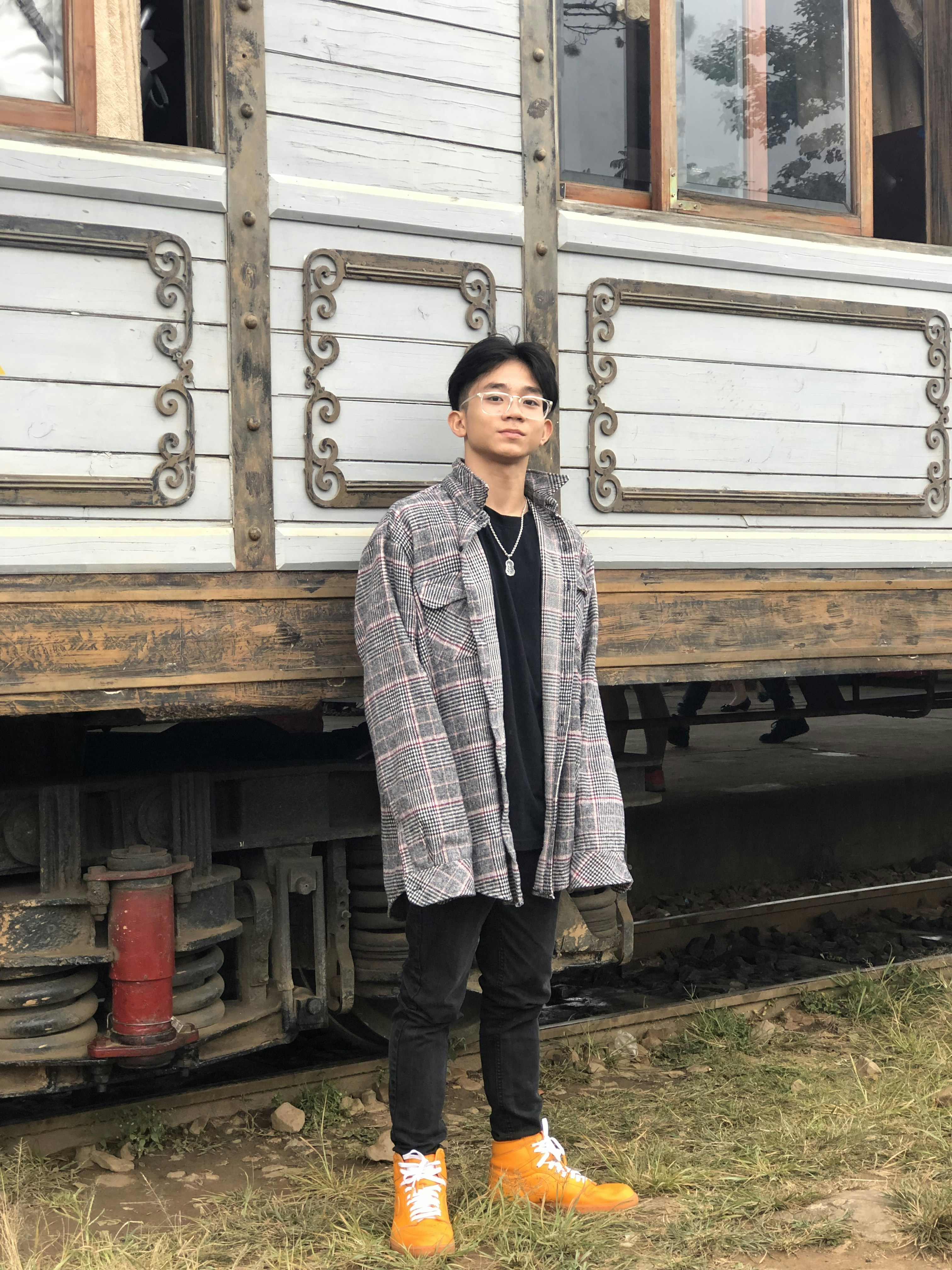 man standing near train