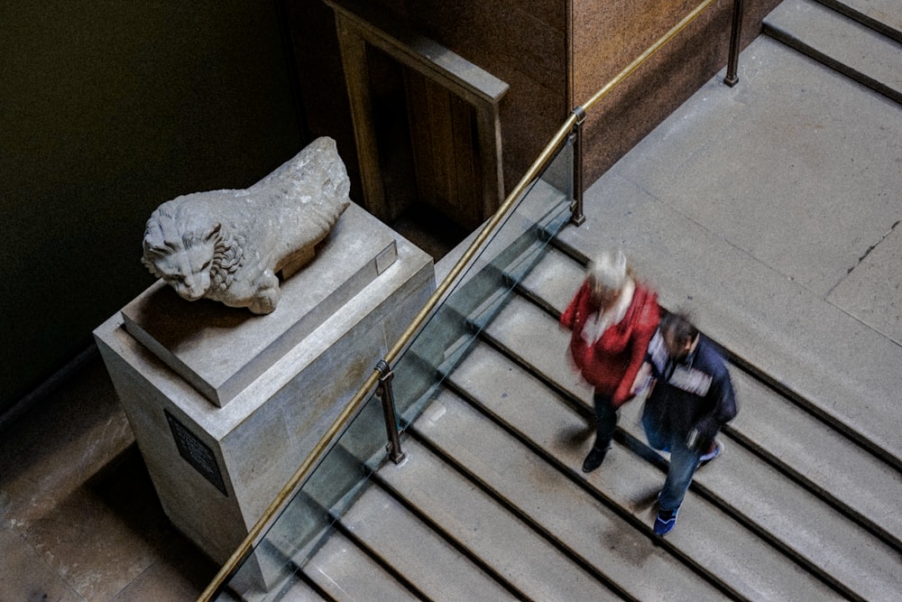 two person walking downstairs