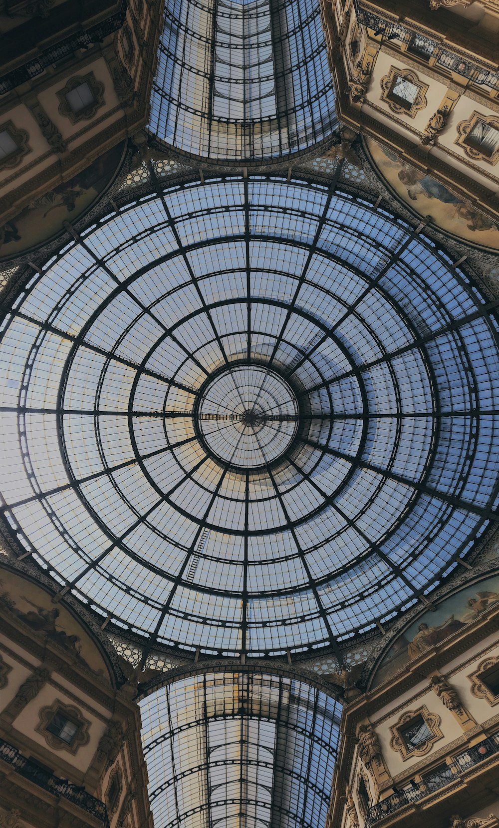 the ceiling of a building with a glass dome