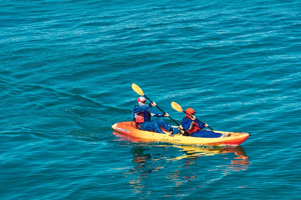 two person riding on kayak