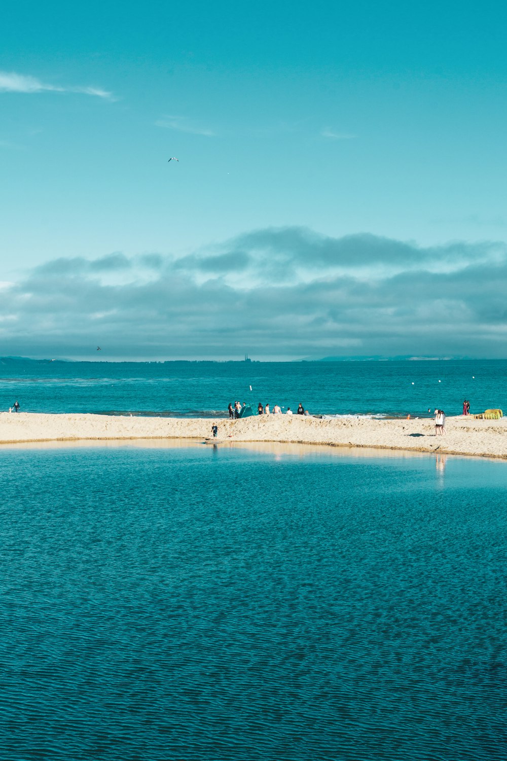 calm body of water during day time