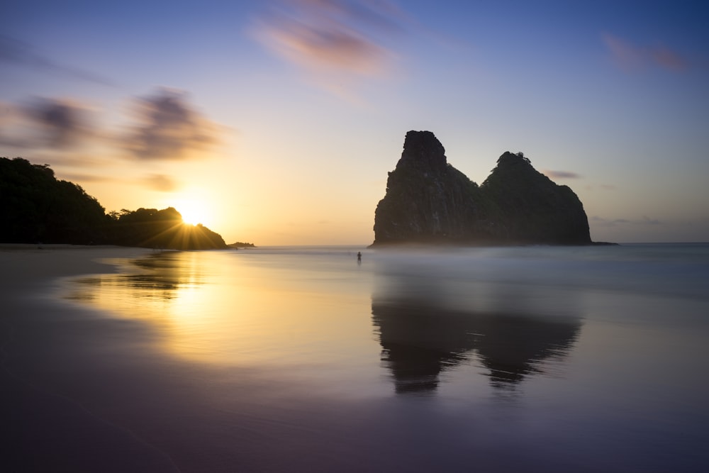 person standing on shore